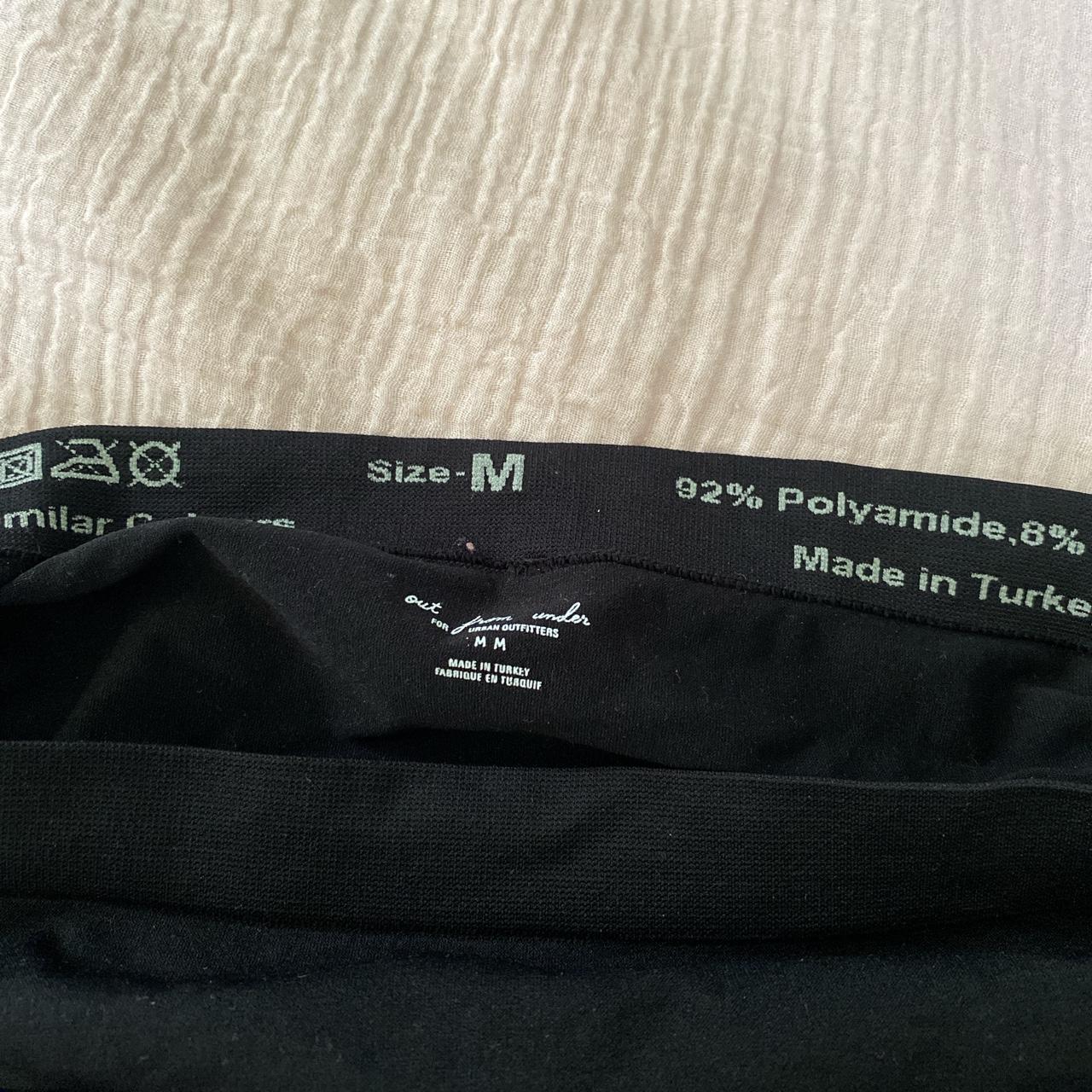 Black spandex mini side slit shorts. Size says... - Depop