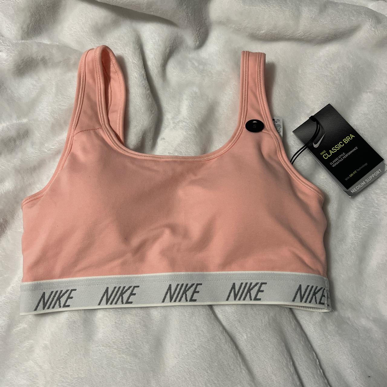 Pink Nike sports bra - Depop