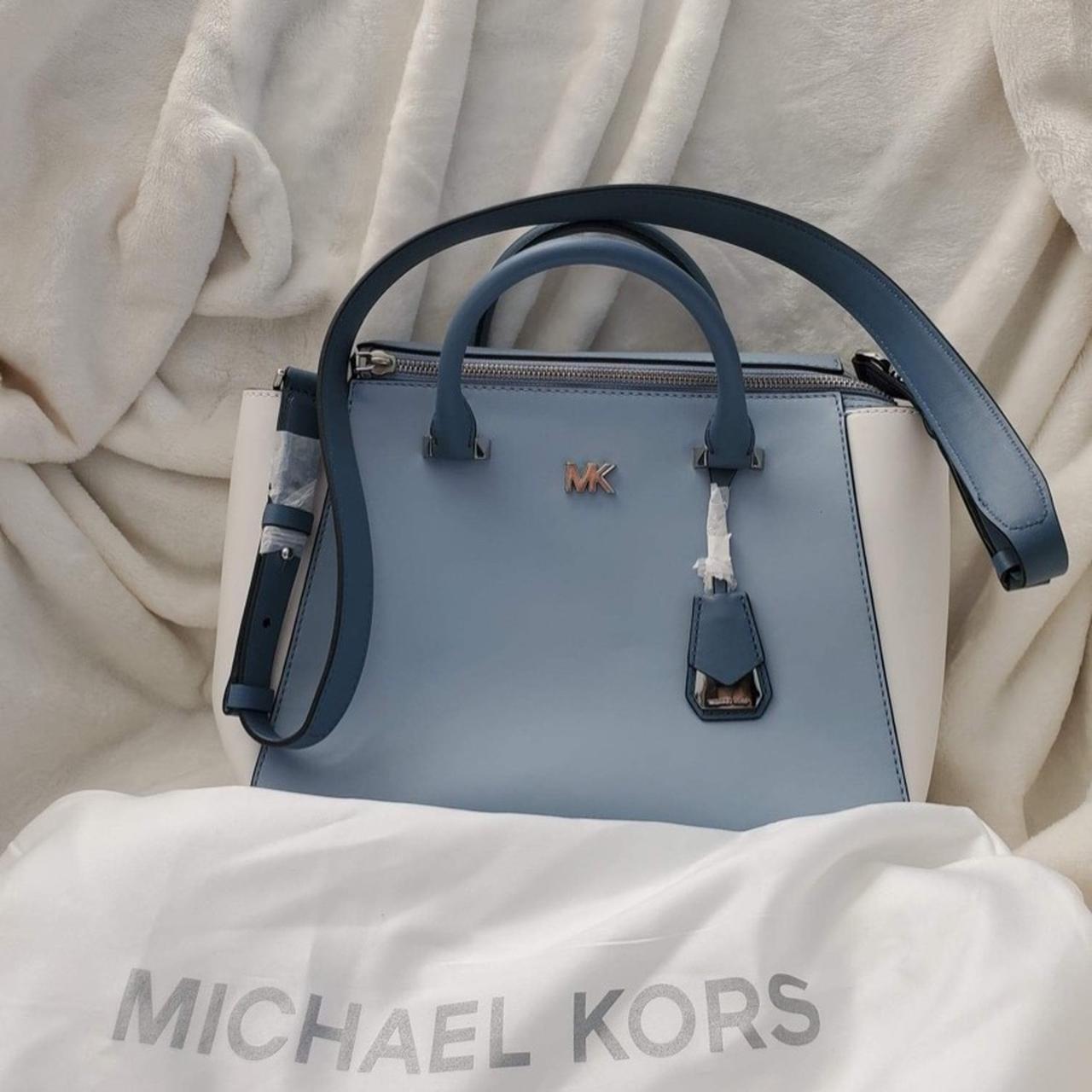 Blue medicalert and white mk purse