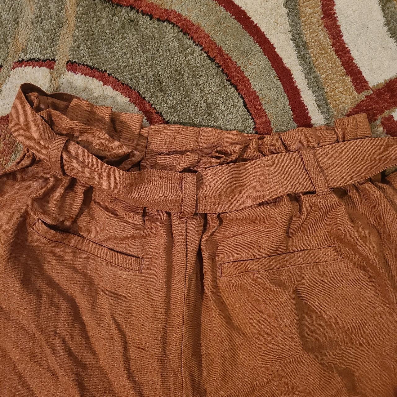 Rust colored high waisted paper bag shorts with... - Depop
