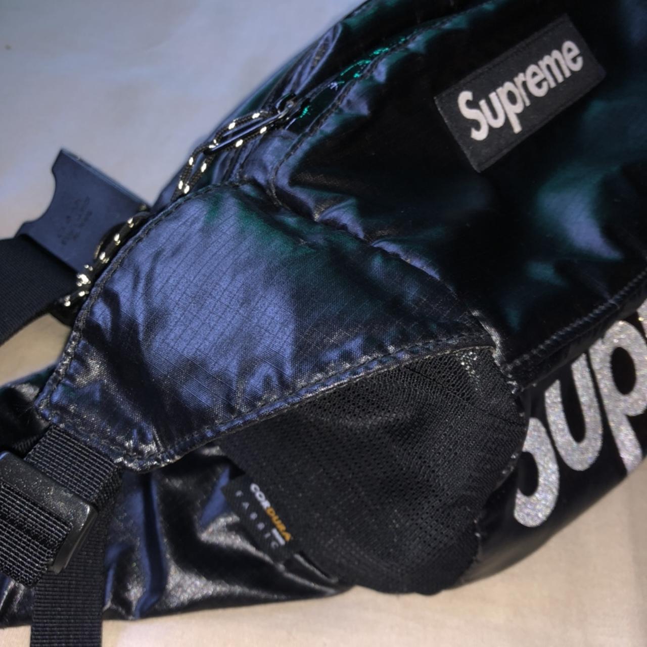 Supreme logo reflective duffel bag 8/10 condition, - Depop