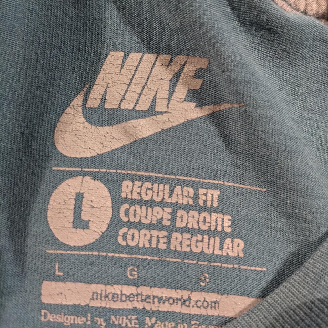 Blue Nike Shirt. Size Large. Big Nike logo, and... Depop