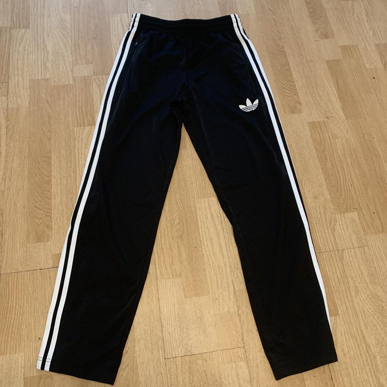 Adidas trackie bottoms Black Great condition Size... - Depop