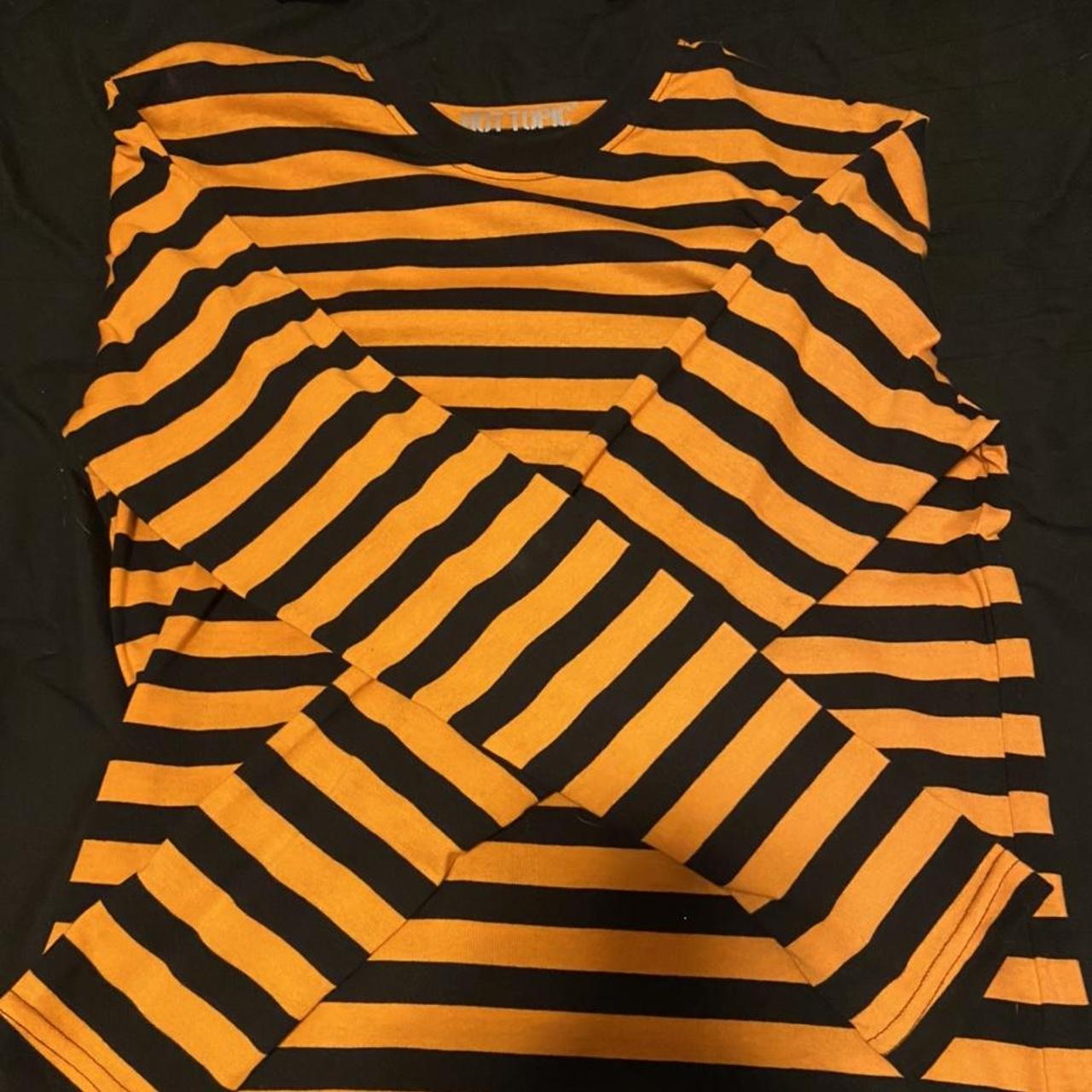 orange and black striped shirt