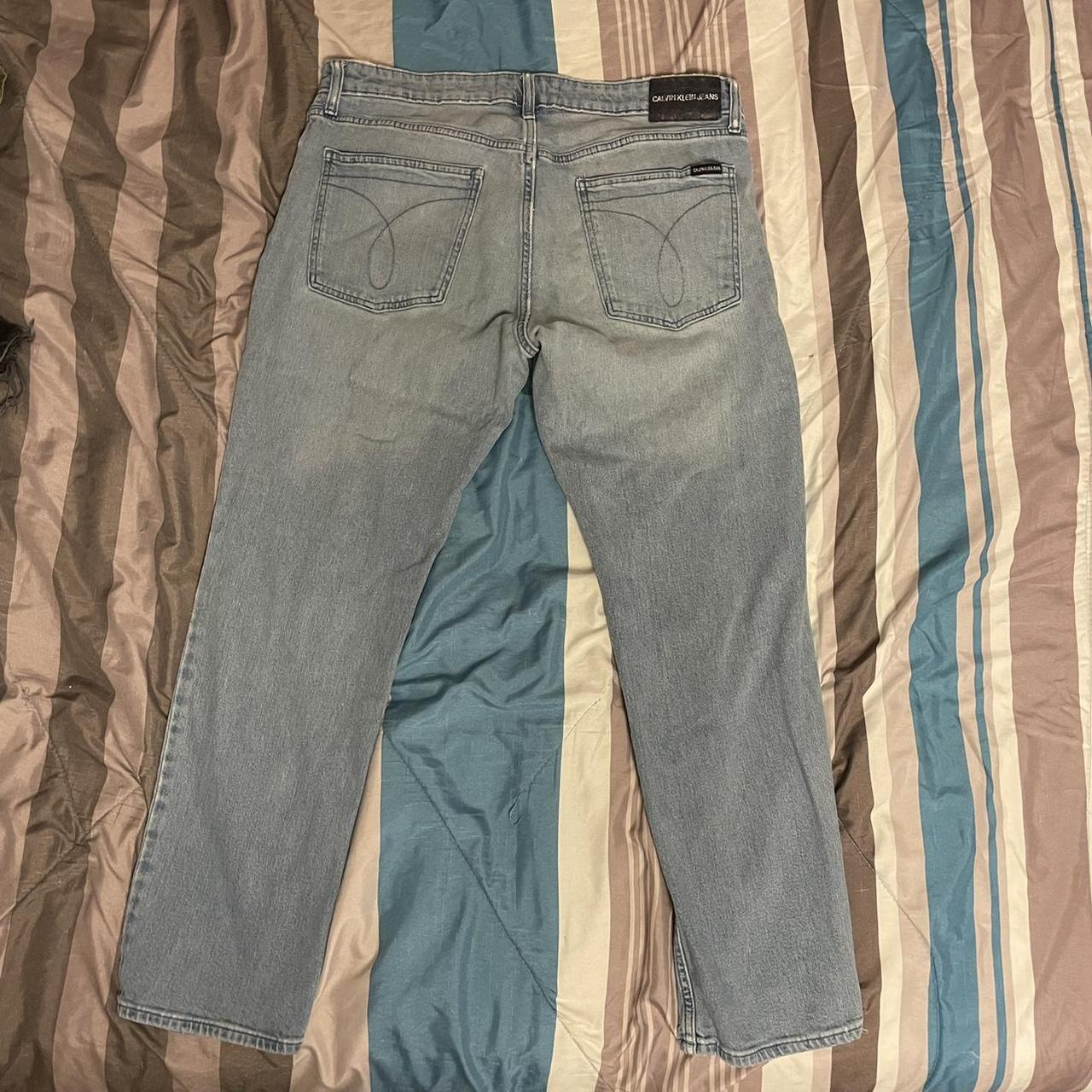 Slightly distressed vintage calvin klein denim pants... - Depop