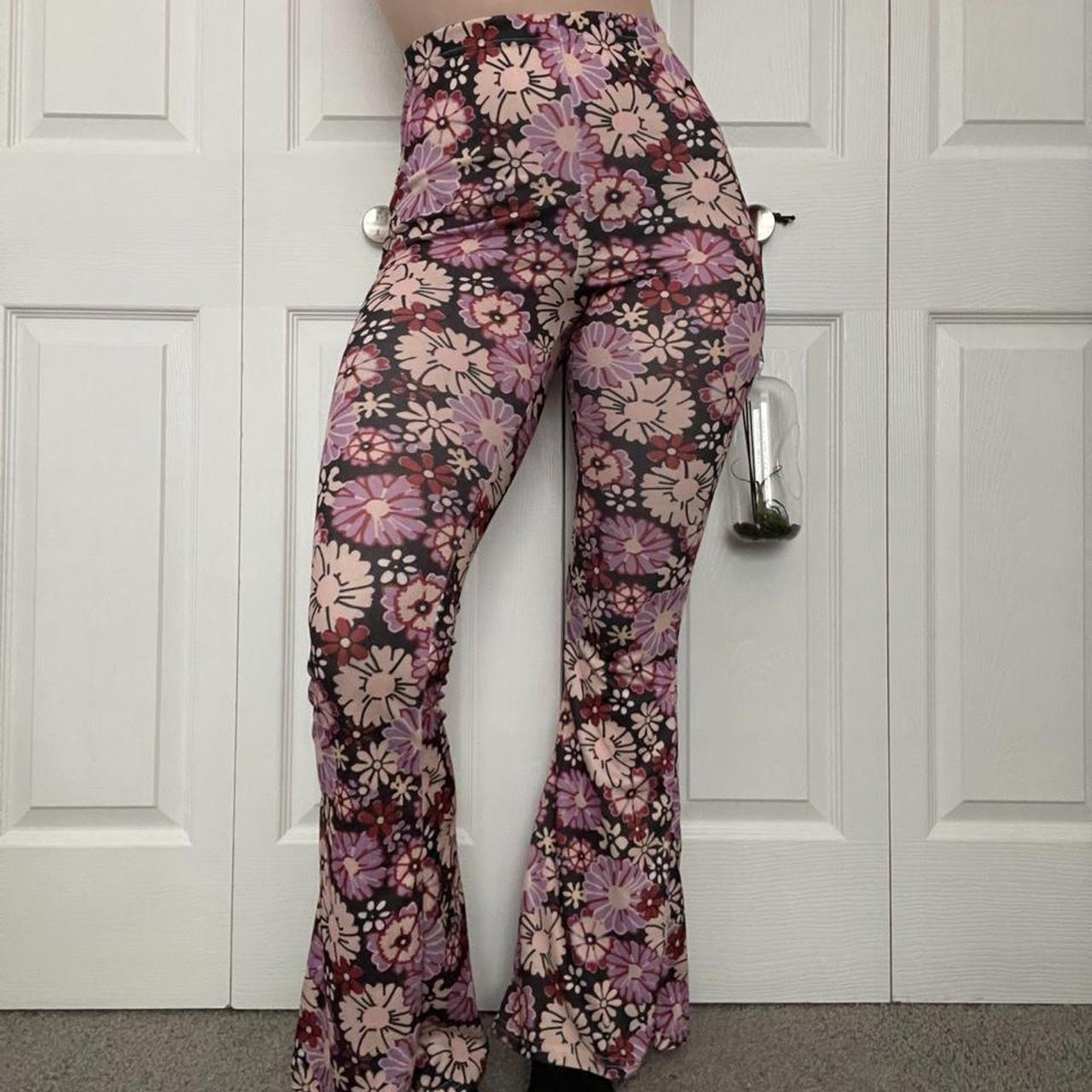 70s floral high wasted flare pants. From nasty gal. - Depop