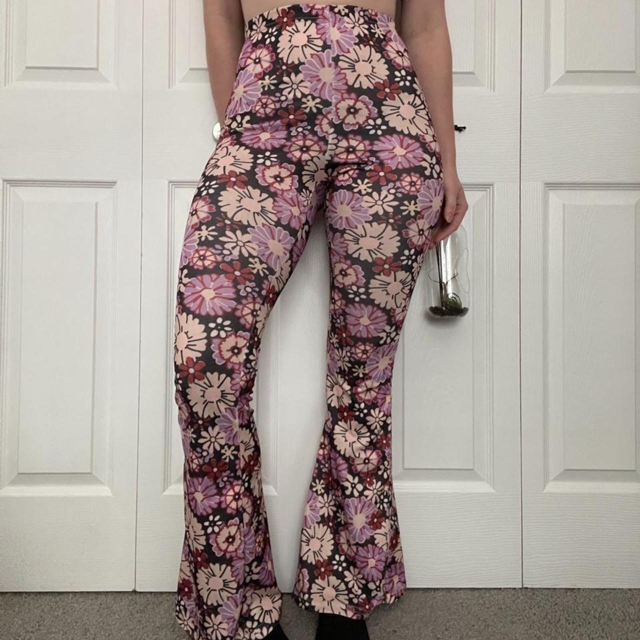 70s floral high wasted flare pants. From nasty gal.... - Depop