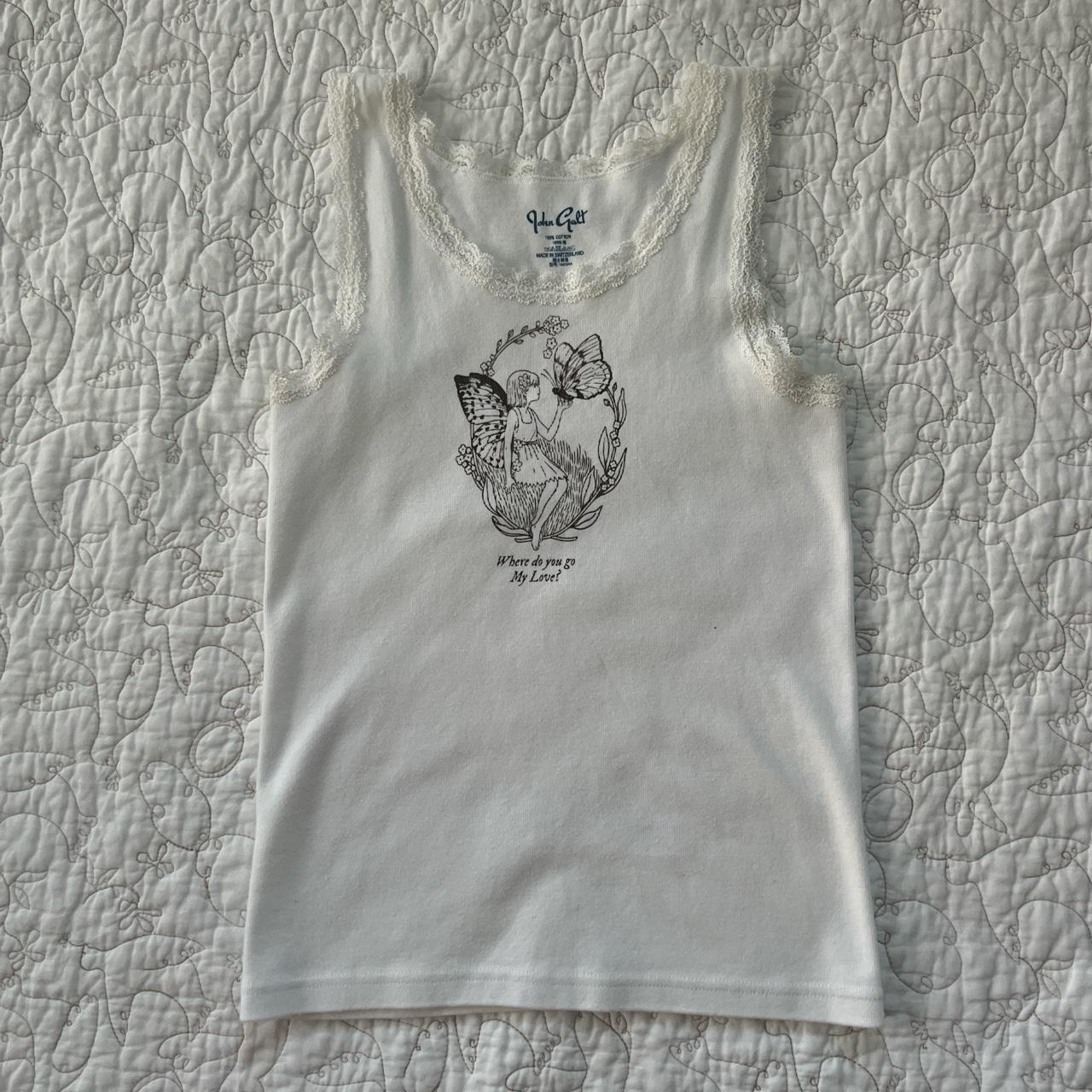 brandy Melville graphic tank top with lace trim one... Depop