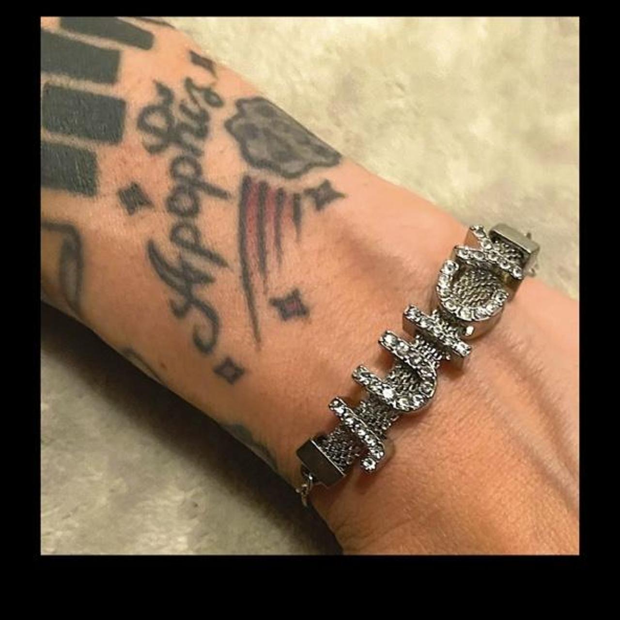 Juicy Couture charm bracelet featuring a crystal - Depop