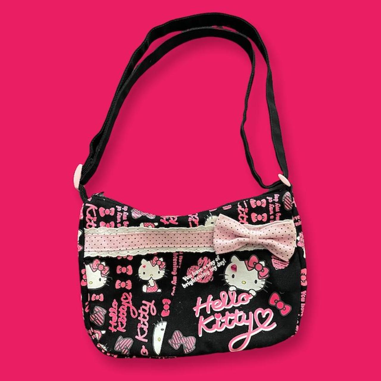 hello kitty black and pink bag. approximate... Depop
