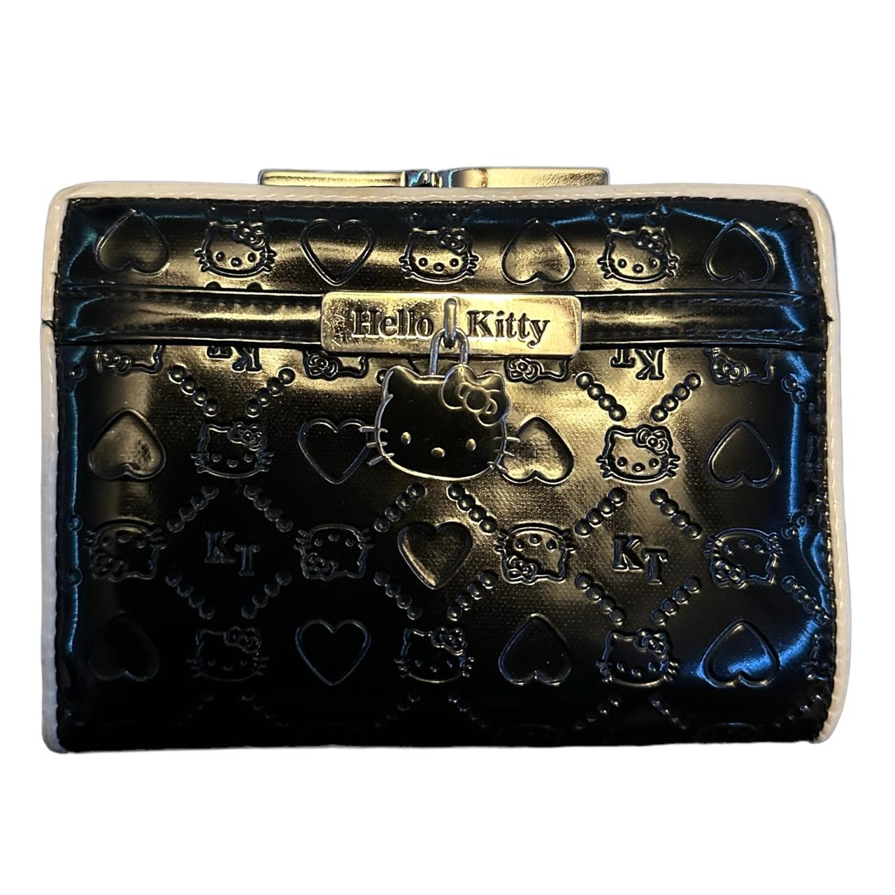 black monogram hello kitty wallet with front hello... Depop