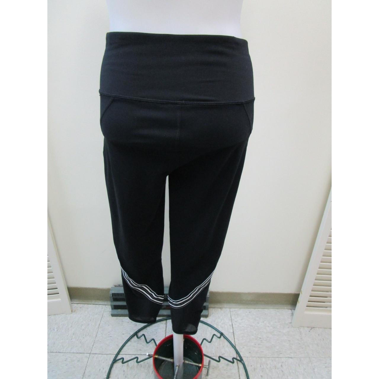 Women’s black yoga pants with white stripe down the... Depop