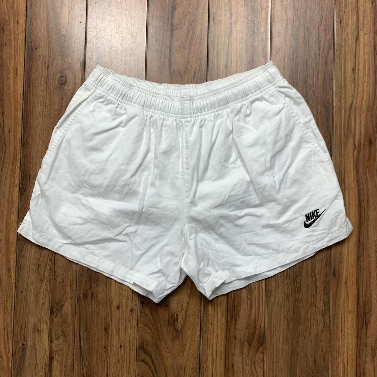 90s Nike White Shorts with embroidered tick on left... Depop