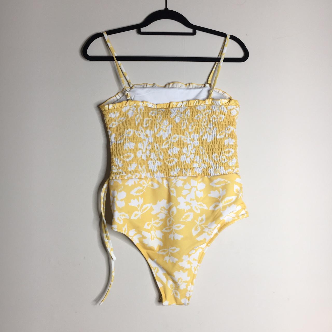 Yellow and white floral swimming costume, women’s... - Depop