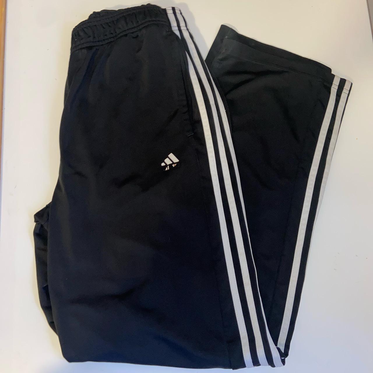 black adidas trackie would fit a size 10-12 message... - Depop