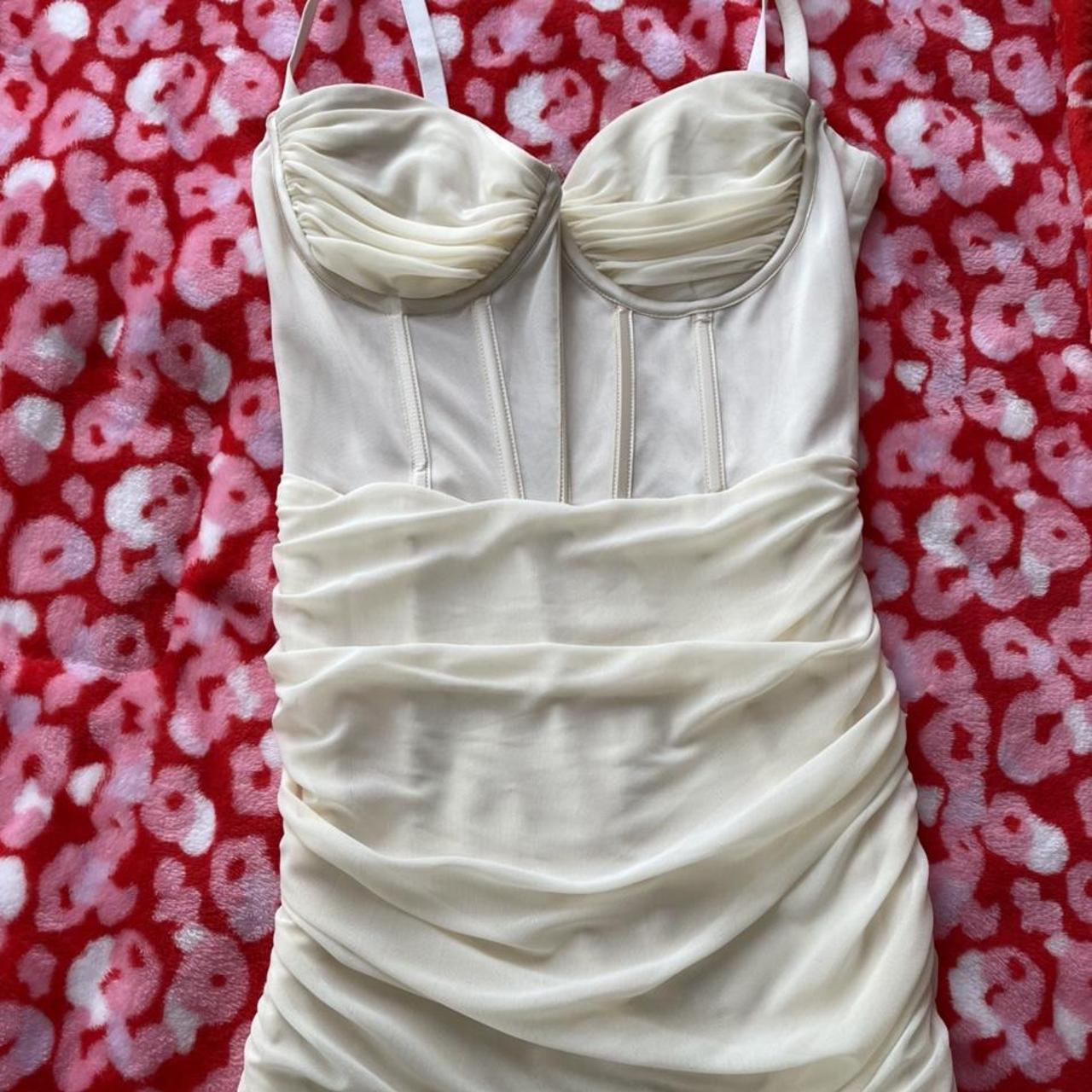 Oh Polly Mesh Bodycon Corset Mini Dress in Ivory.... Depop