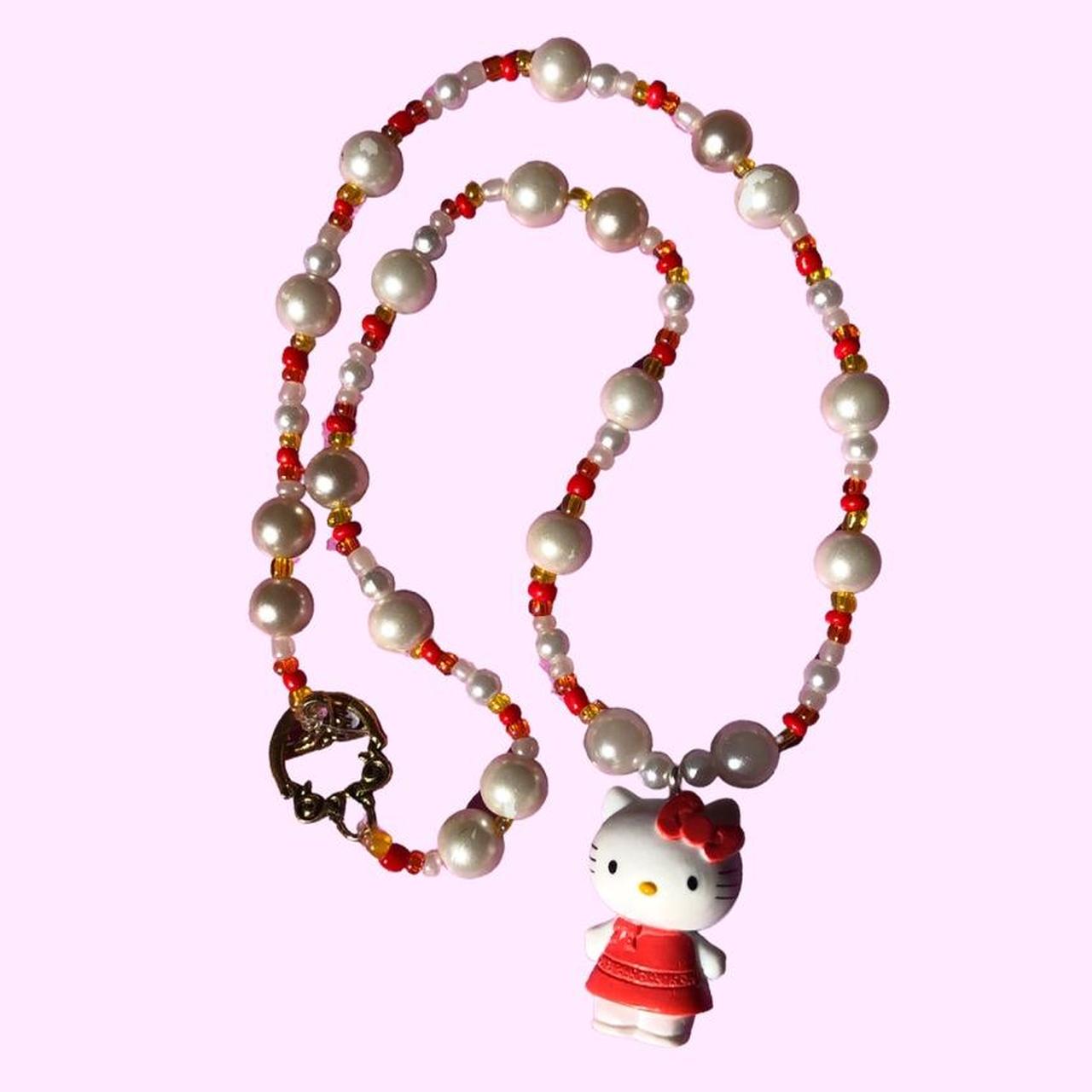 hello kitty necklace ♡ ⊹ ˚. Pearl beaded necklace... Depop