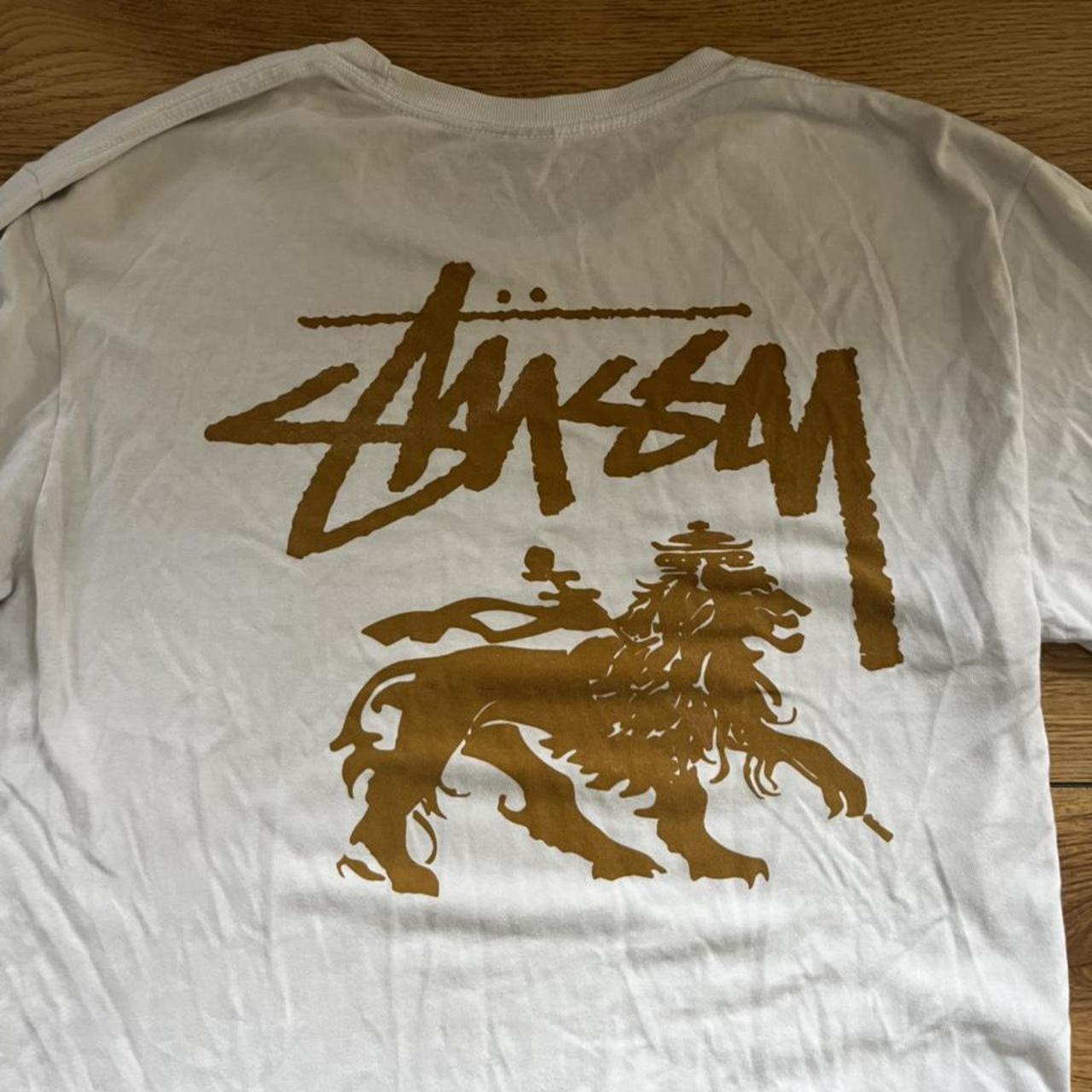 Stüssy white and gold long sleeve. Good condition,... - Depop