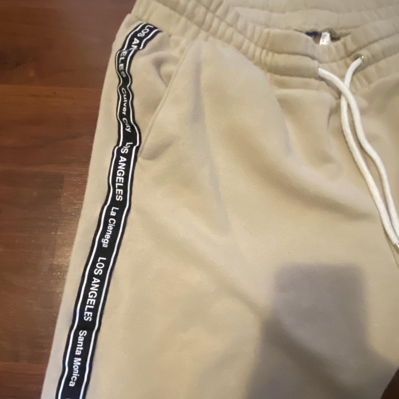 Large joggers. Los Angeles printed on sides with... - Depop