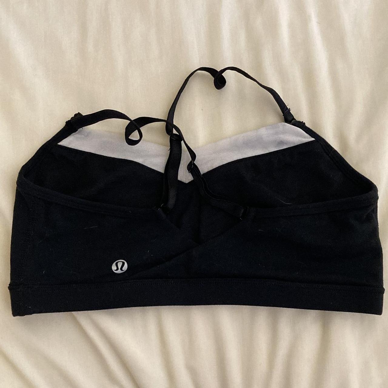 Lululemon sports bra featuring adjustable cross back... Depop