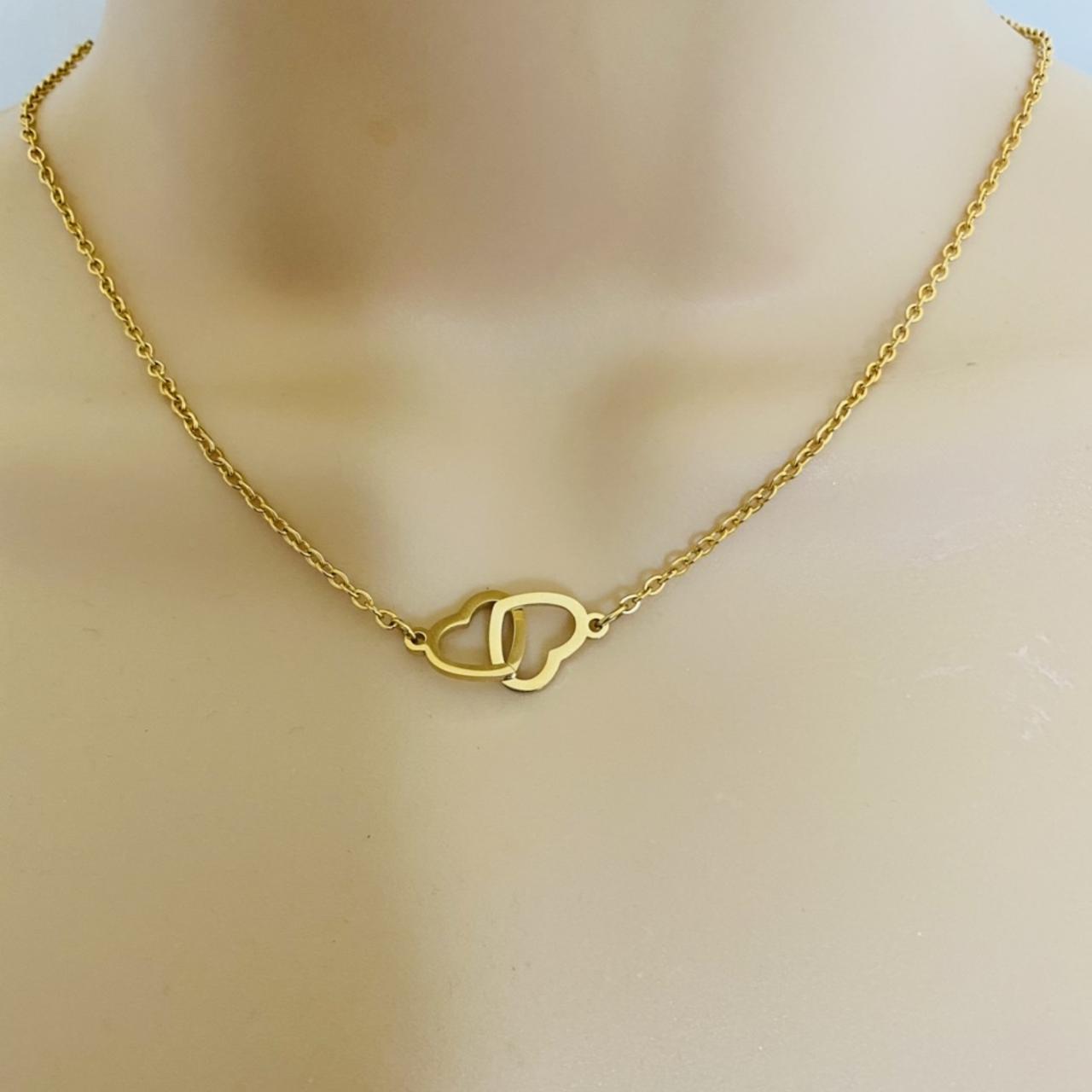 Gold Colour Heart Necklace. Double Heart Necklace.... - Depop