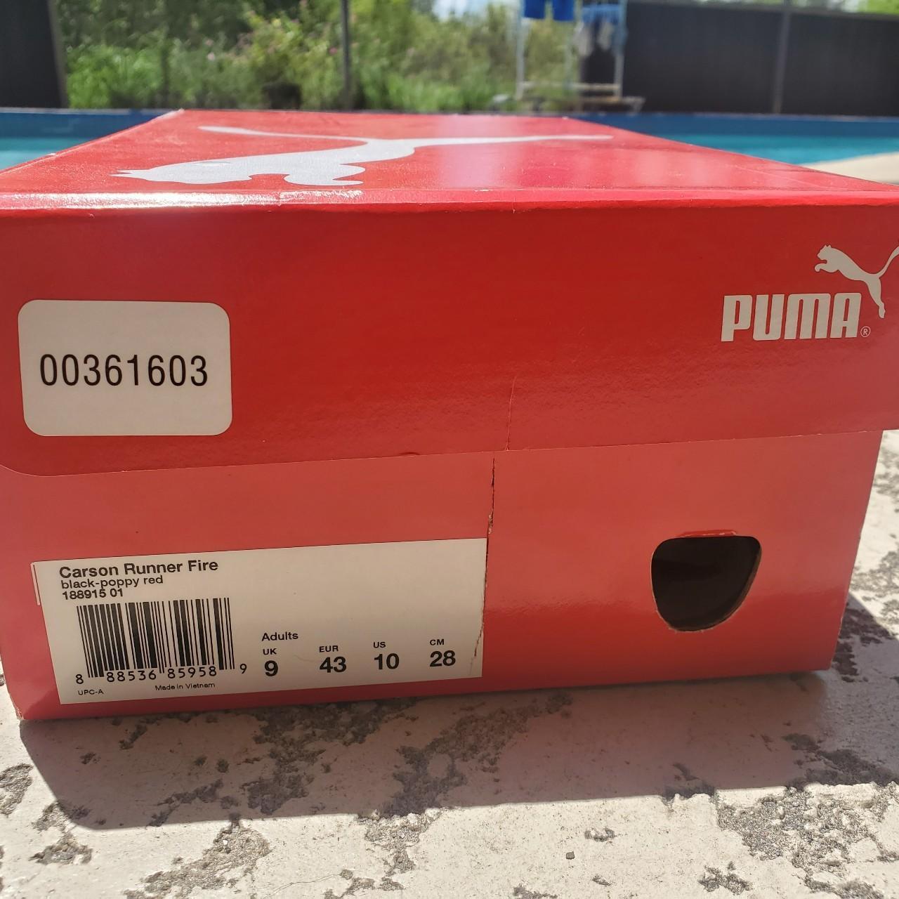 Puma carson best sale runner orange men