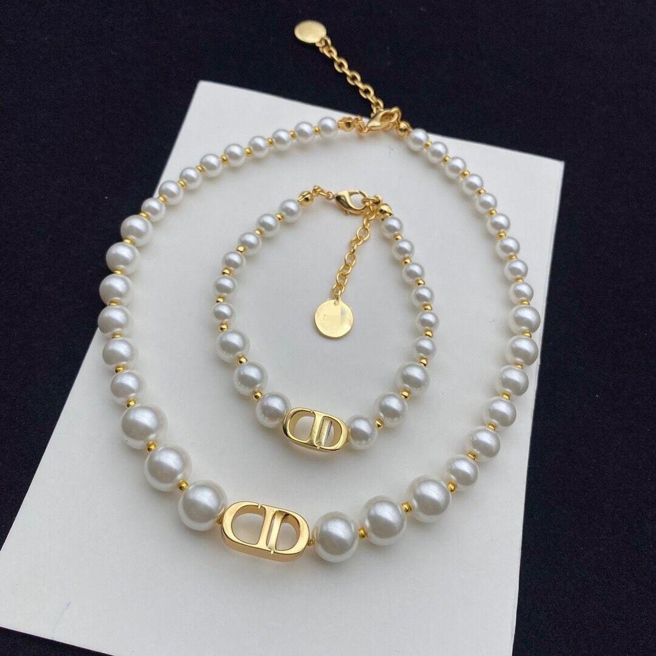 CD Pearl necklace and bracelet set Depop