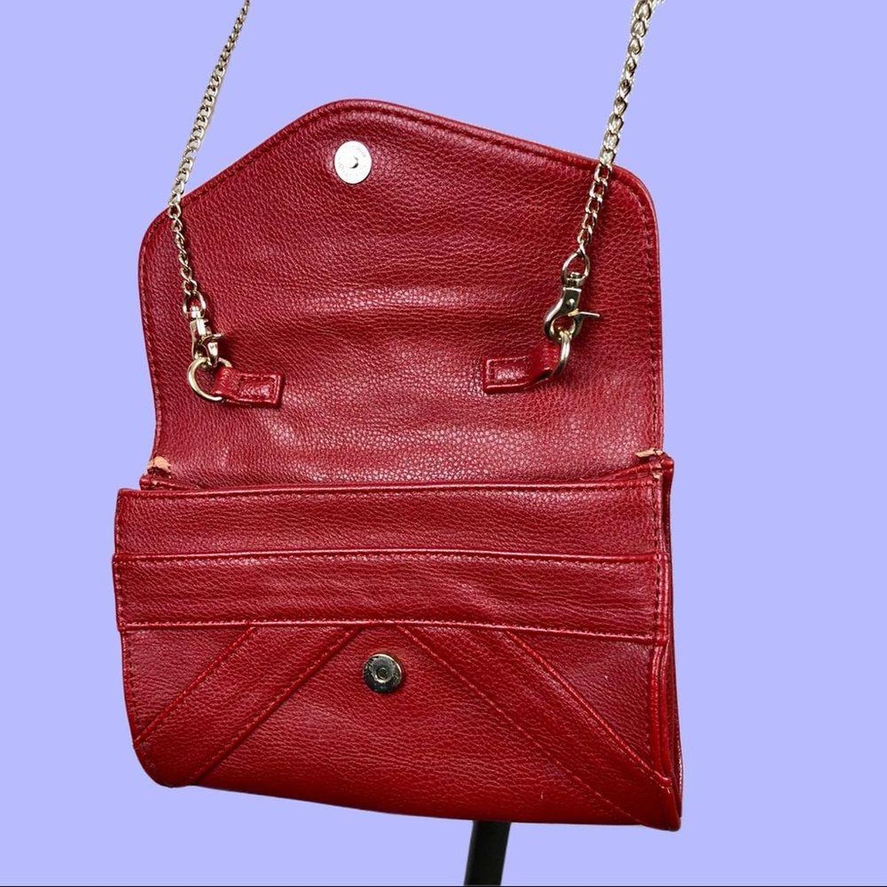 This cute red crossbody purse is preowned, but... Depop