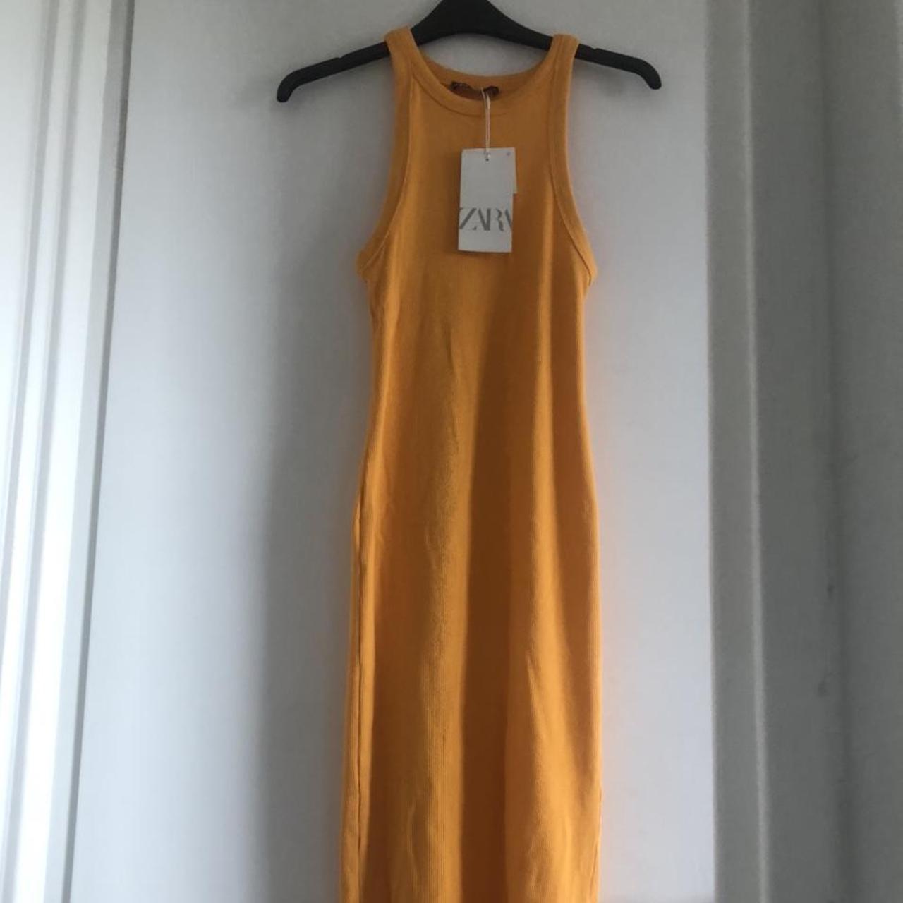 Free shipping! Zara yellow body con midi dress... Depop