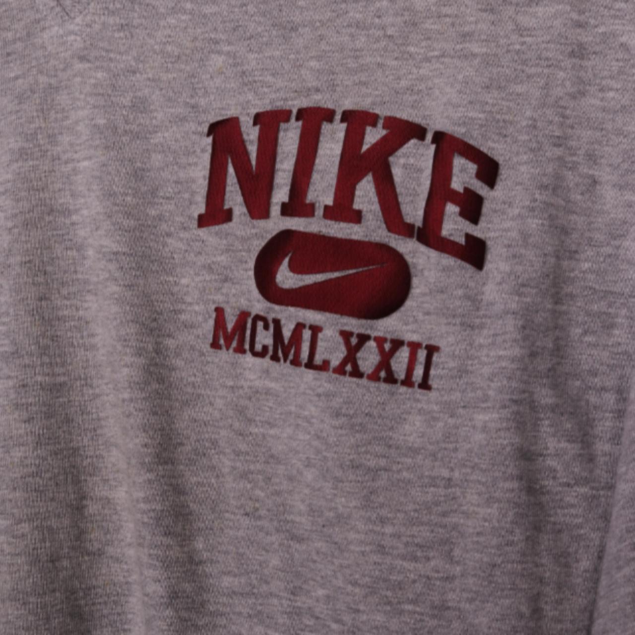 Vintage Nike Long-Sleeve Printed Logo Sweatshirt in... - Depop