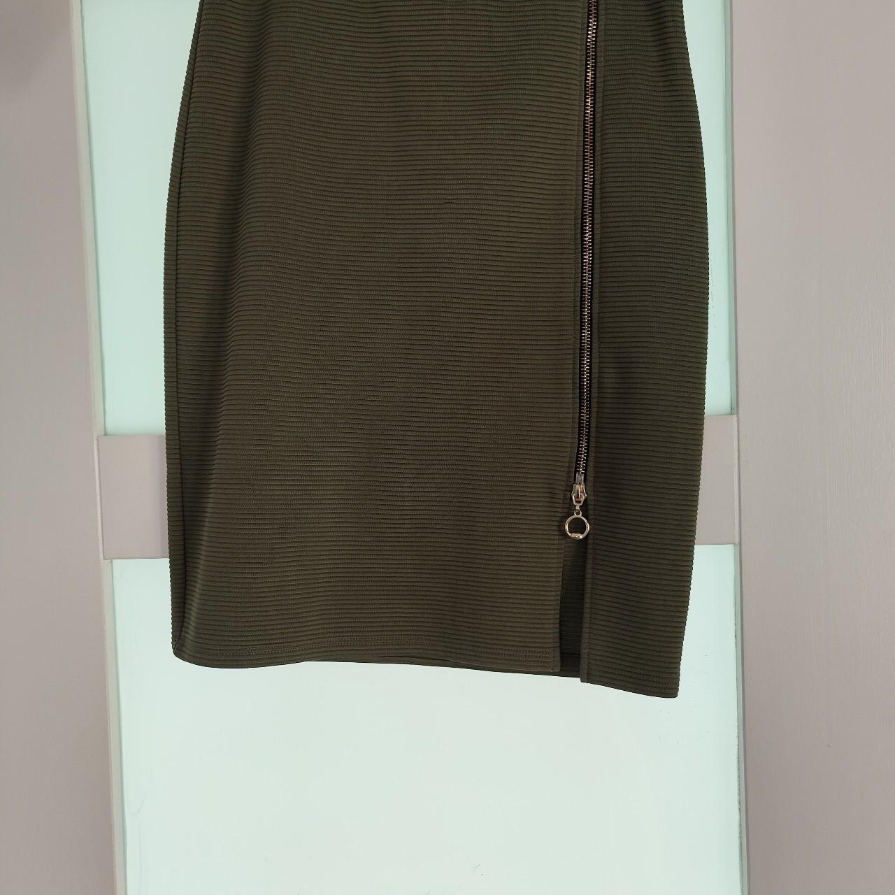Green/khaki bodycon skirt. Size10 from Primark, had... Depop