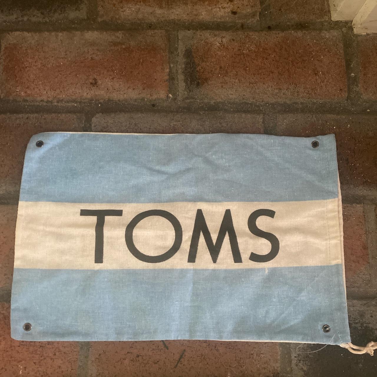 TOMS flag My mother got one of these in a TOMS... Depop