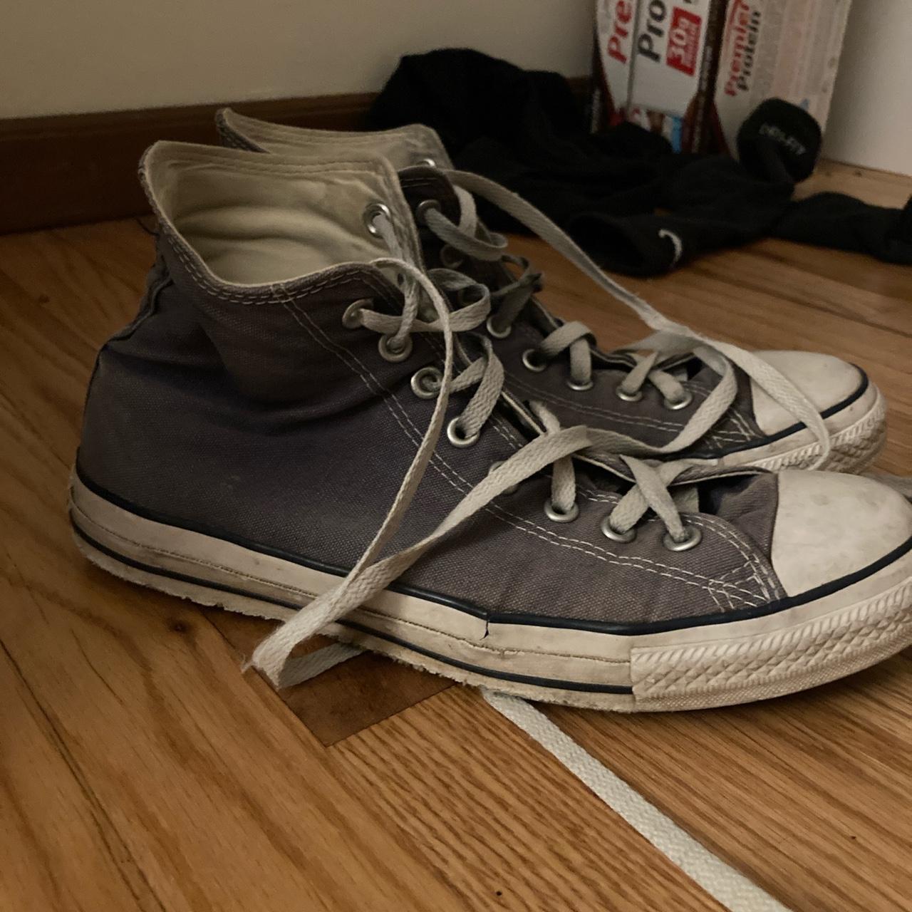 navy blue high top converse