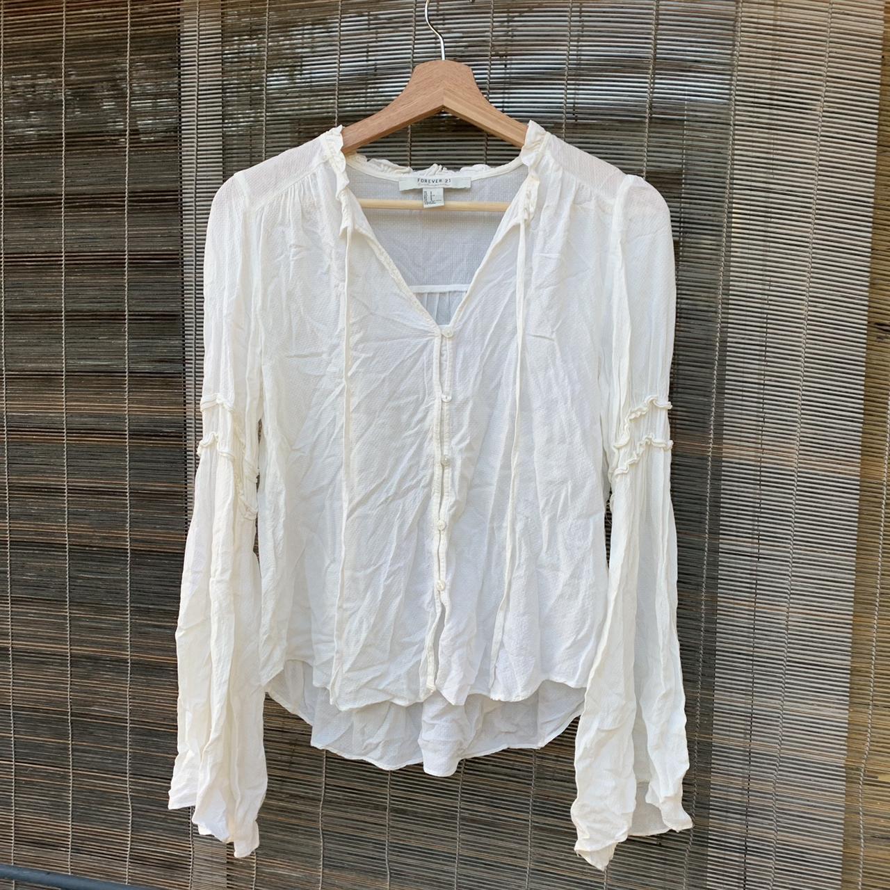 White flowy long sleeve button up top from Forever... - Depop