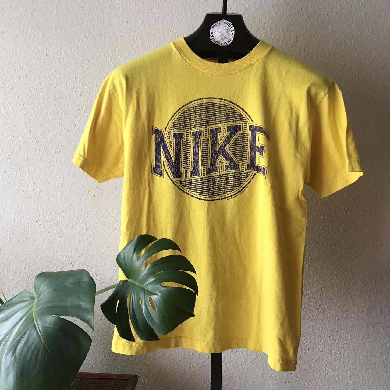 nike shirt yellow graphic like 90s early 00s logo... - Depop