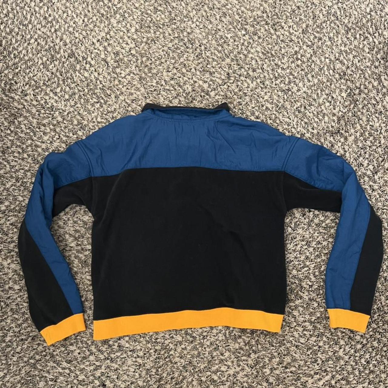 Nike black orange blue crew neck zip up large... Depop