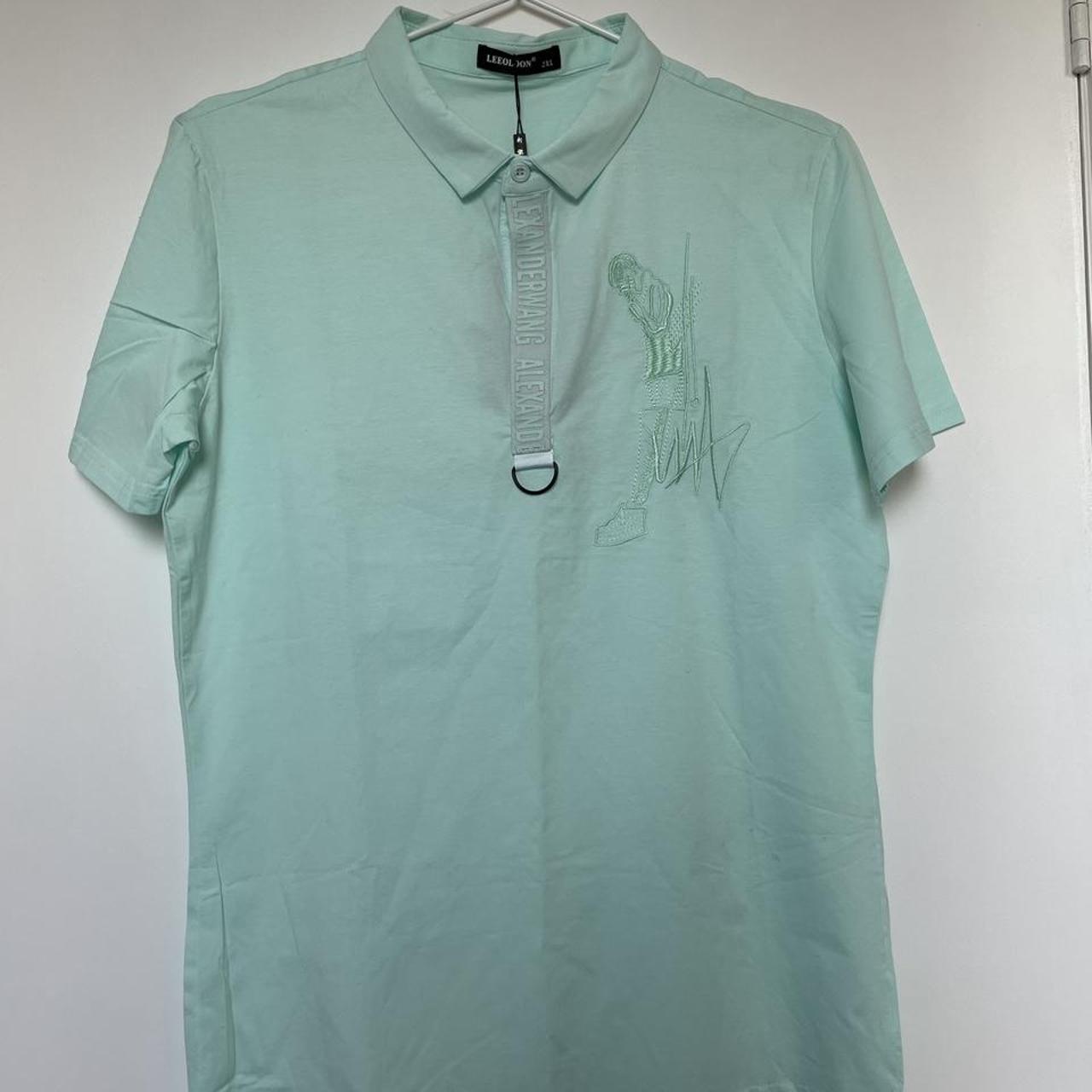 Teal polo with embroidery design Brand new with tags... - Depop