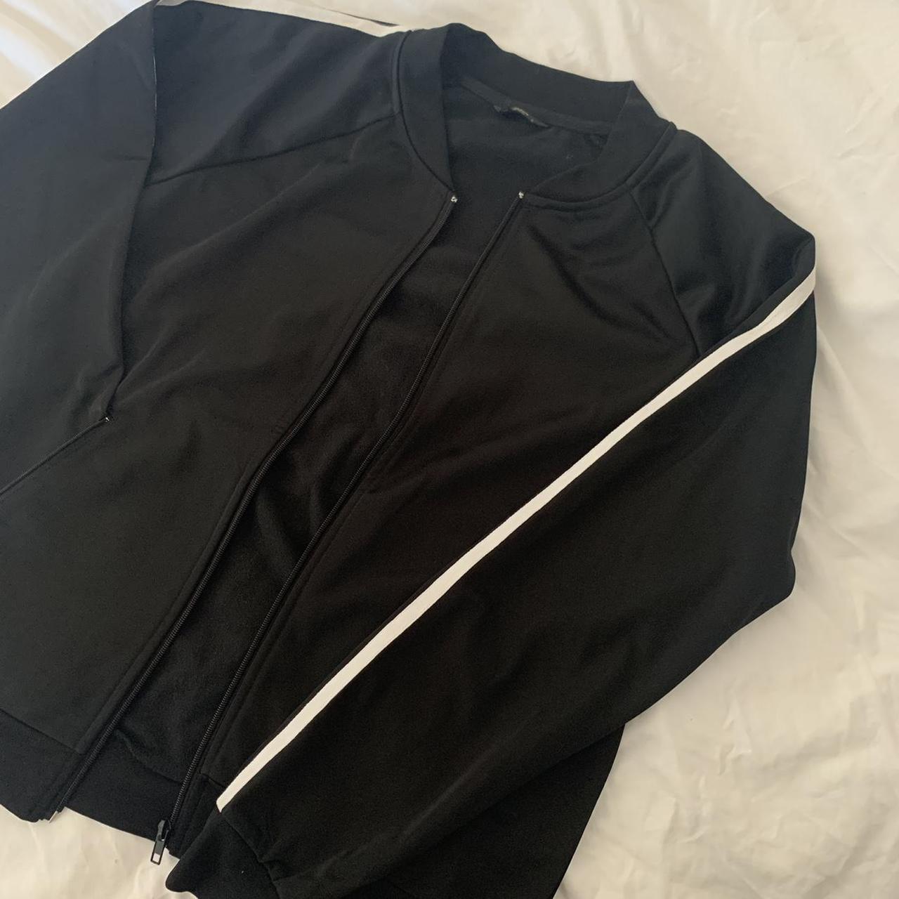 Black jacket with white piping on sleeve. Sporty... - Depop