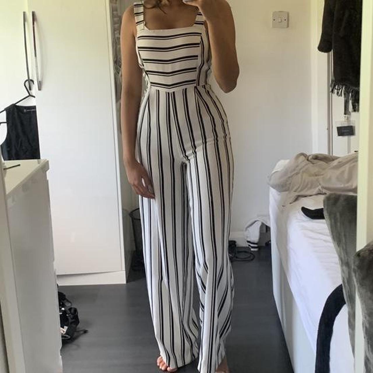 Stradivarius Black and white striped jumpsuit zip. Depop