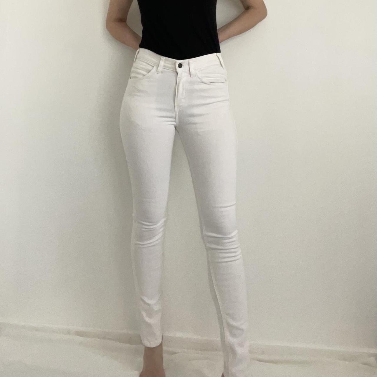 White Levi's jeans. Skinny leg and stretch material. - Depop