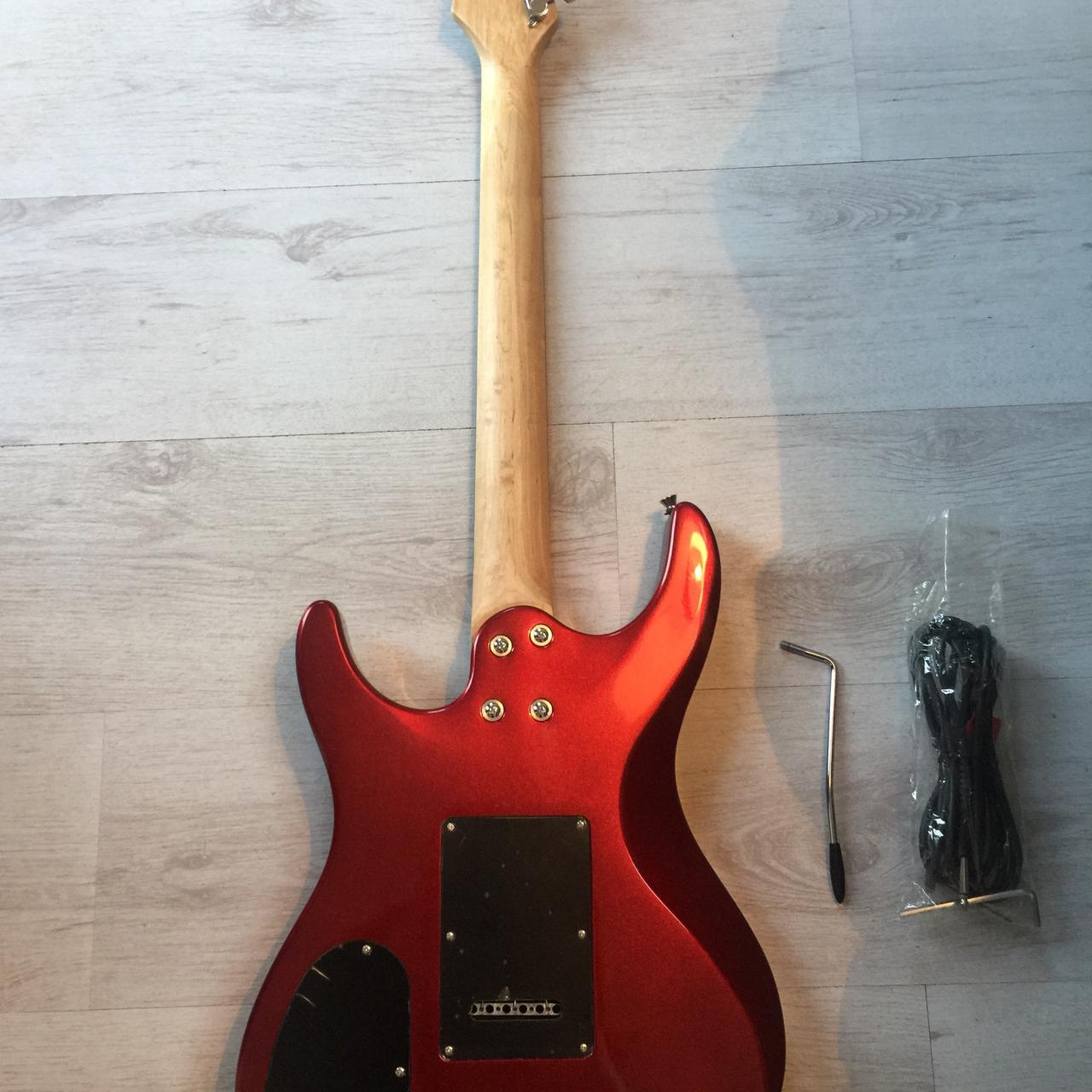 Washburn RX10 in metallic red, mint condition, used - Depop