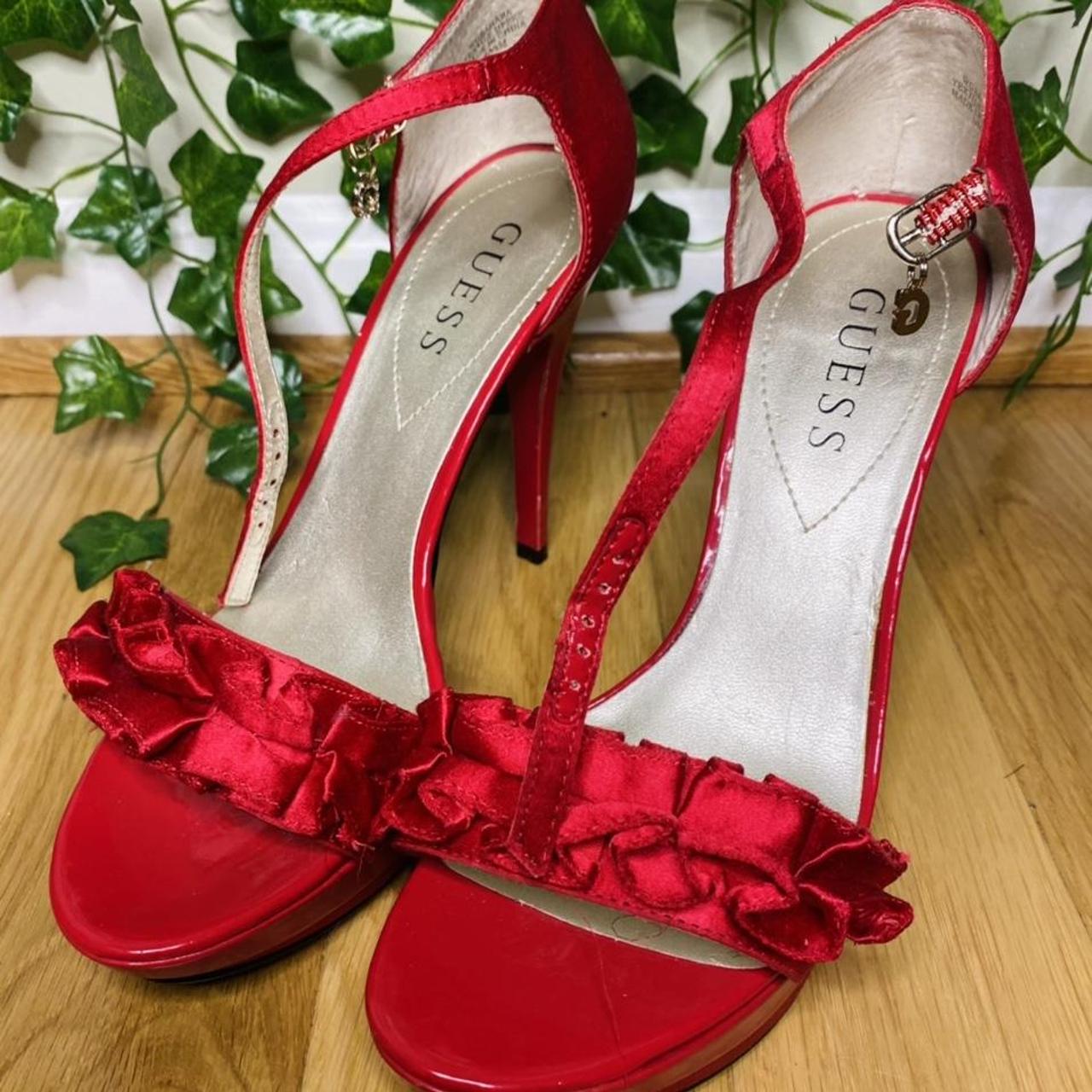 guess red high heels