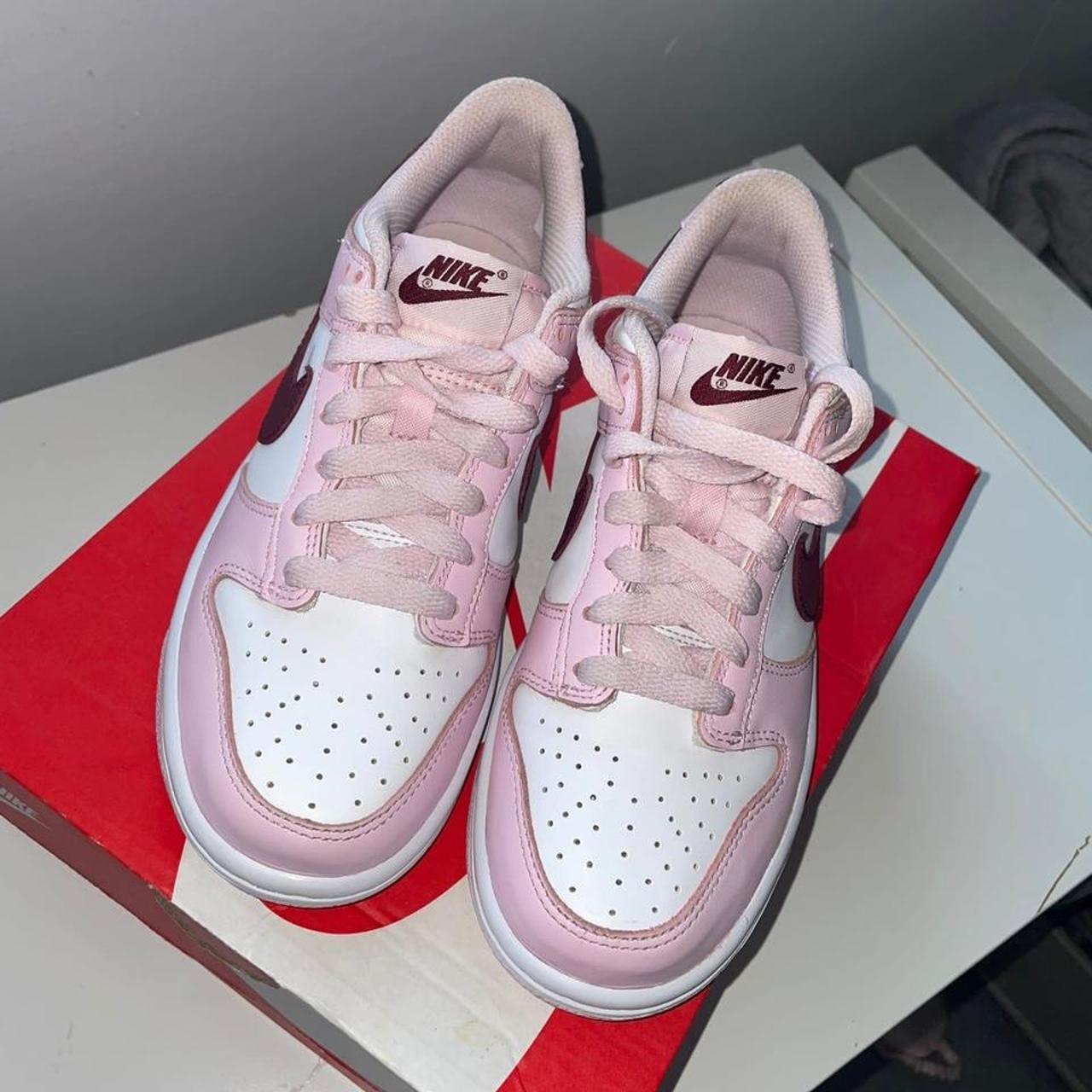 dunk low pink foam on feet