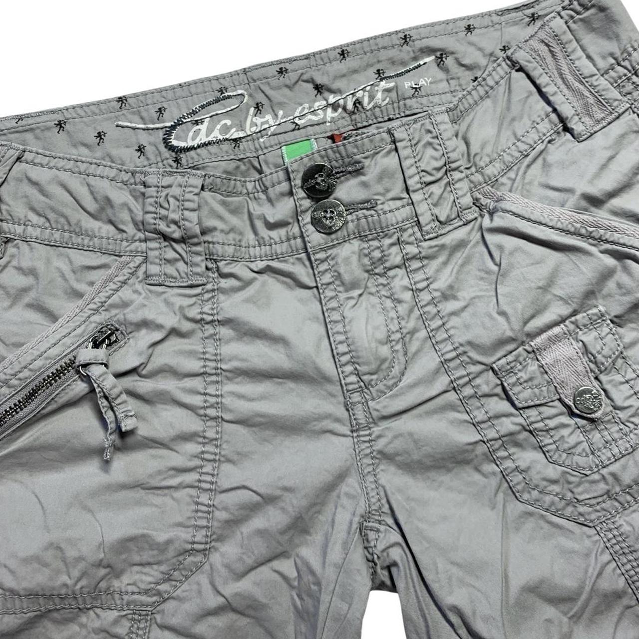 Grey cargo pants. Low rise and petite. Buttons and... Depop