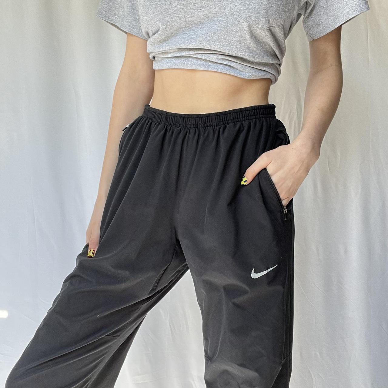 nike track pants with ankle zipper