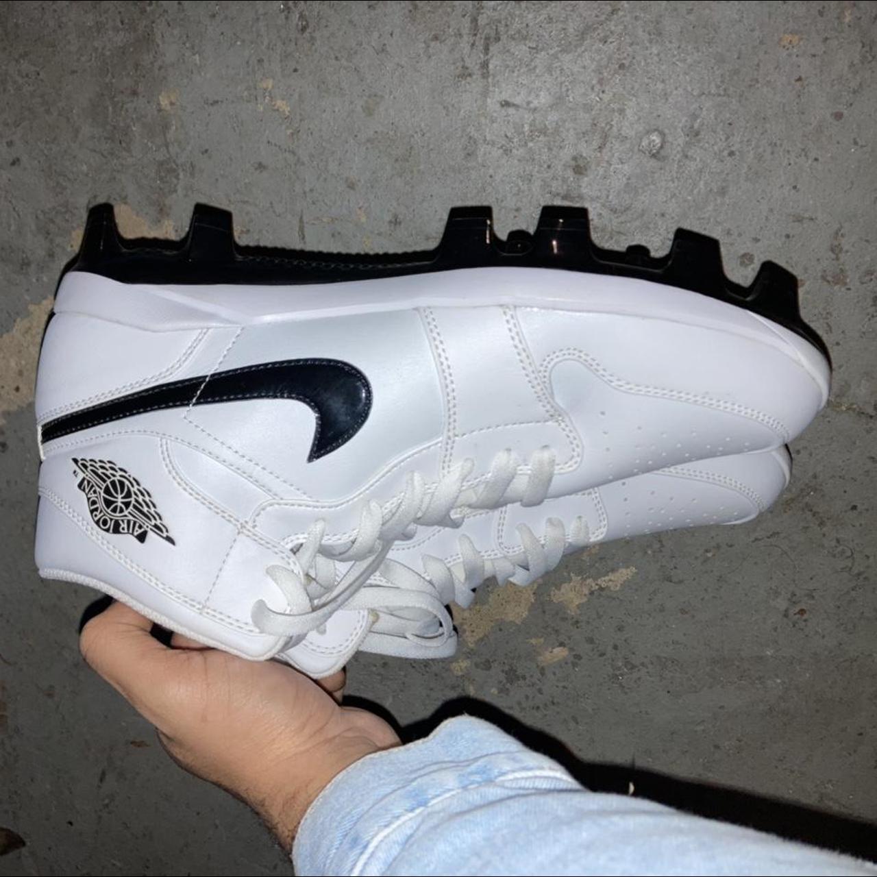 black and yellow jordan cleats