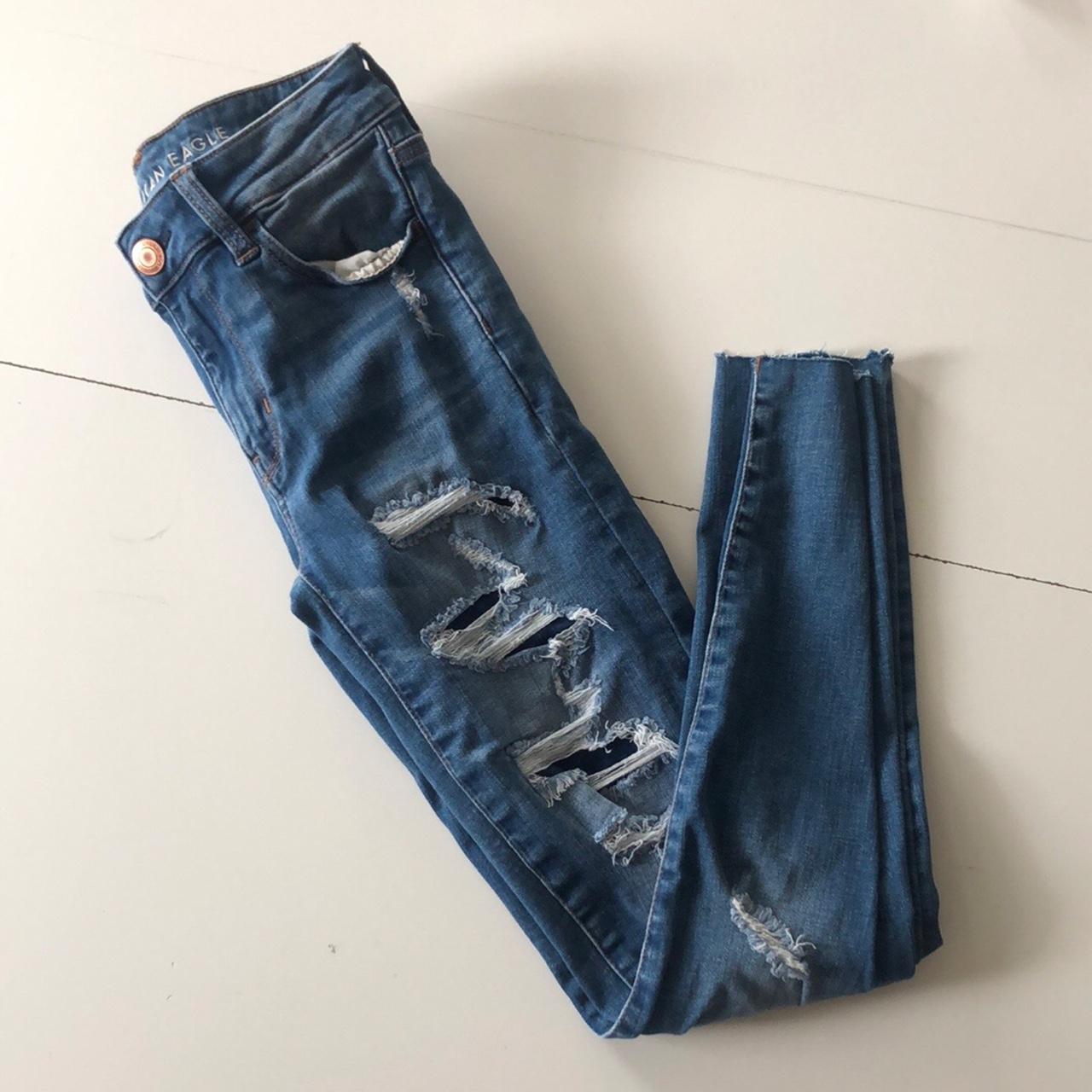 American Eagle Medium wash super stretch jeans with... - Depop