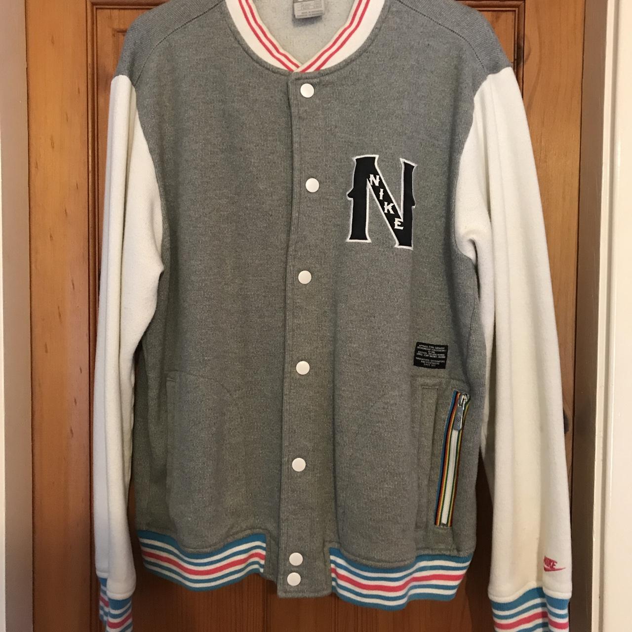 NIKE baseball jacket with multicoloured detailing. - Depop