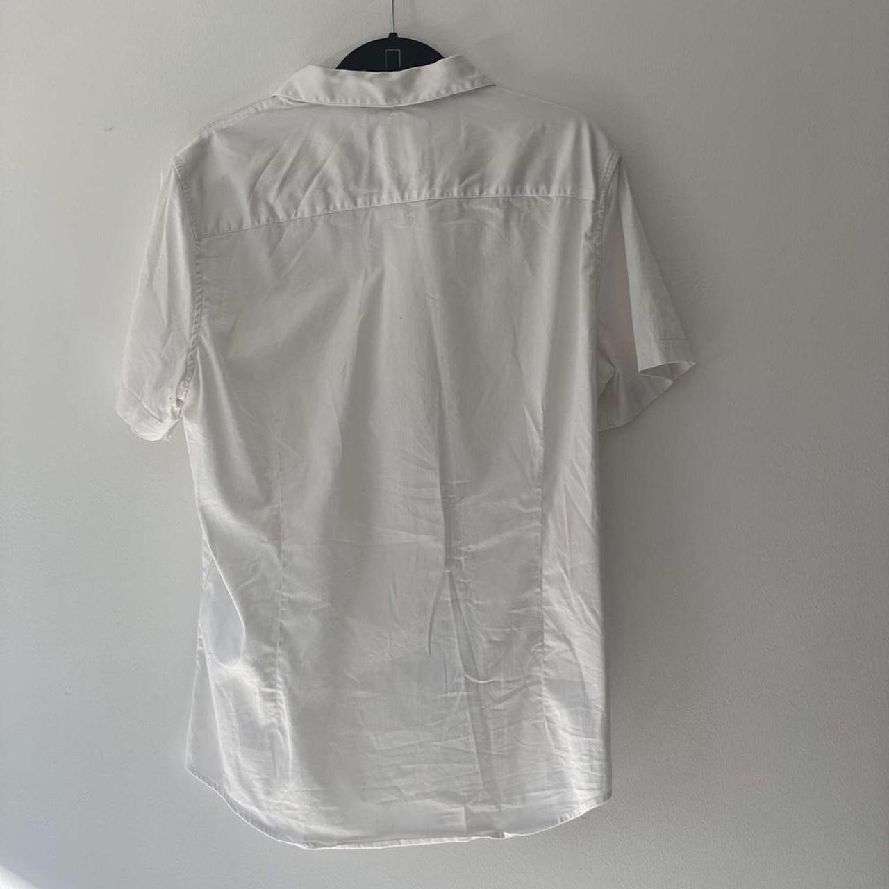 ARMANI/EXCHANGE white shirt A/X front... - Depop