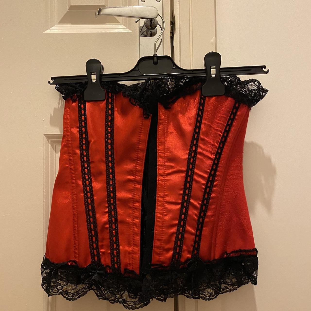 Red and black corset. Only worn once for a... - Depop